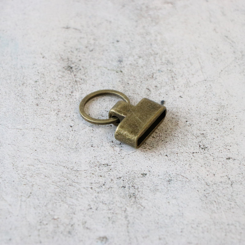 Two Screw-In Key Fobs 1in Antique