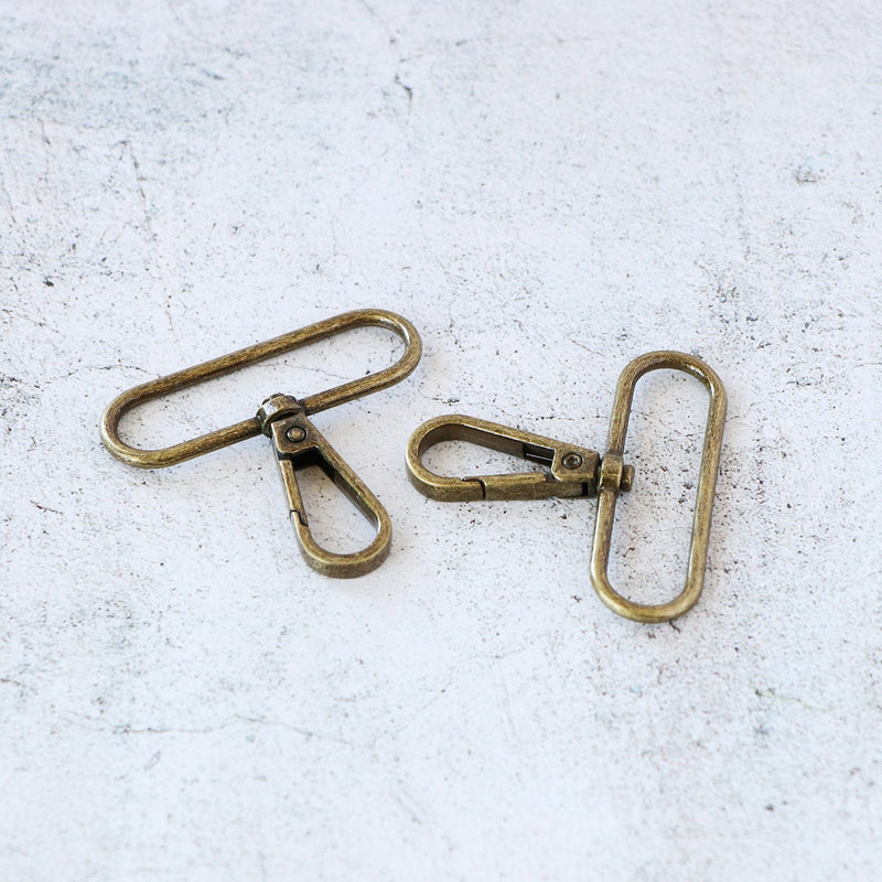 Two 2in Swivel Hooks Antique