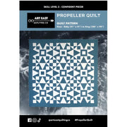 Geometric triangles and squares in the Art East Quilting Propeller Quilt Pattern design