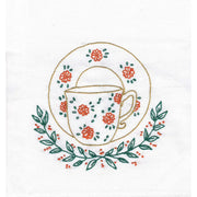 Floral Teacups by Aunt Martha’s featuring coral flowers and green leaves embroidery