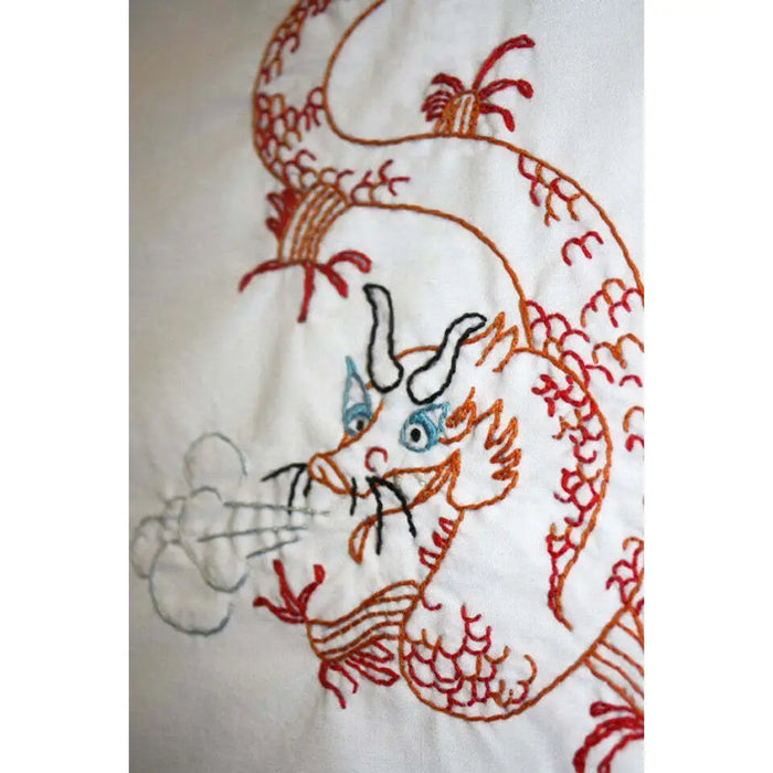 Red embroidered dragon with blue eyes from Aunt Martha’s Oriental Designs collection