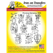 Iron-on transfer sheet showcasing Aunt Martha’s Primitive Christmas designs and patterns
