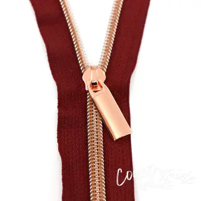 Burgundy #5 Nylon Rose Gold Coil Zippers: 3 Yards with 9 Pulls