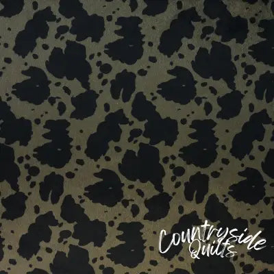 Cow Black Olive Faux Fur 1/2 Yard