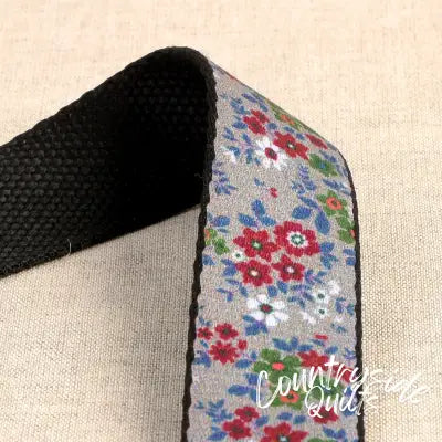 Flowered Webbing on Grey 1-3/16in x 22yds