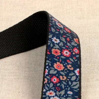 Flowered Webbing on Navy 1-3/16in x 22yds