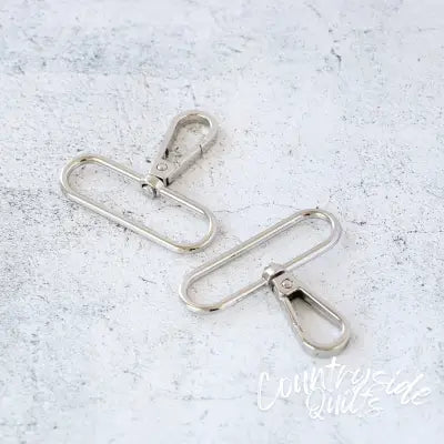 Four 2in Rectangle Rings Nickel
