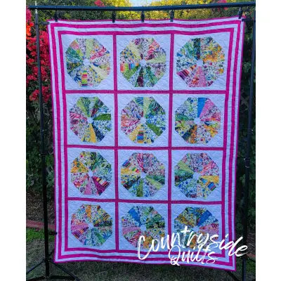 MERRILY WE ROLL ALONG QUILT PATTERN