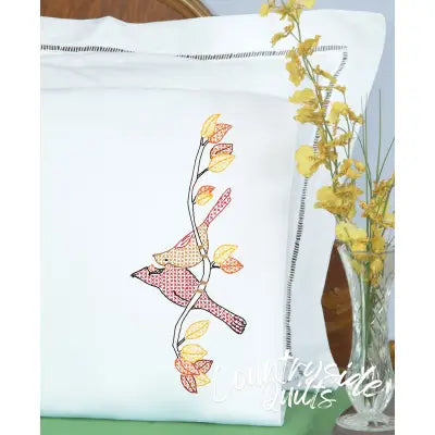 A Pair of Cardinals Perle Edge Pillowcases