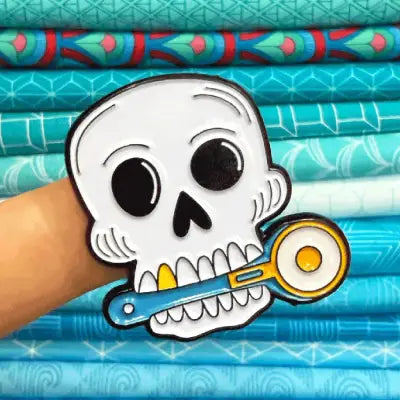 Skull with Rotary Cutter Enamel Pins