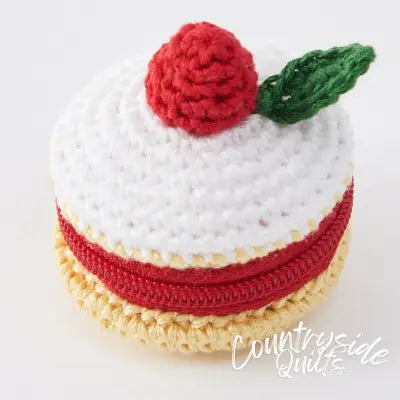 Tiny pouch crocheted with embroidery floss (Cake)