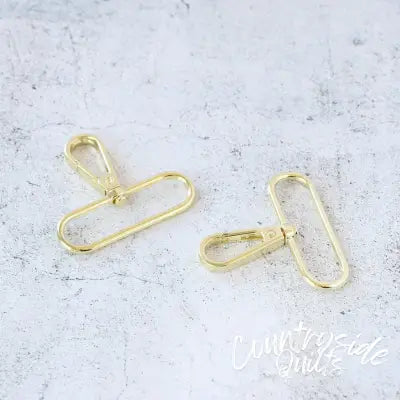 Two 2in Swivel Hooks Gold