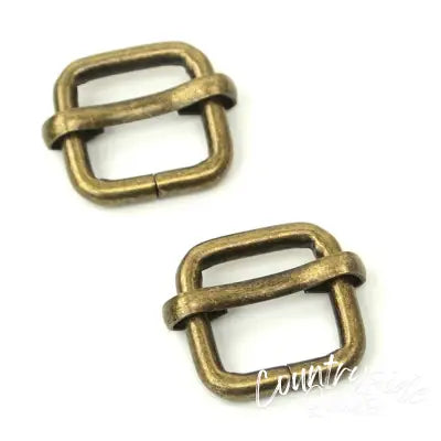 Two Slider Buckles 1/2 Antique"